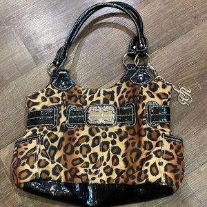 Sienna Richie leopard print purse